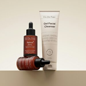 Retinol serum bottles and facial cleanser tube