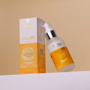 A bottle of sunscreen and a box of sunscreen